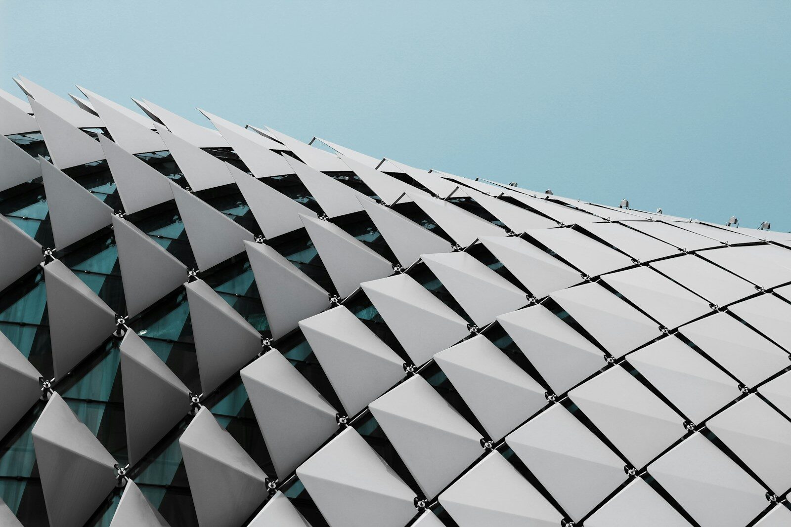a close up of a building with a sky background